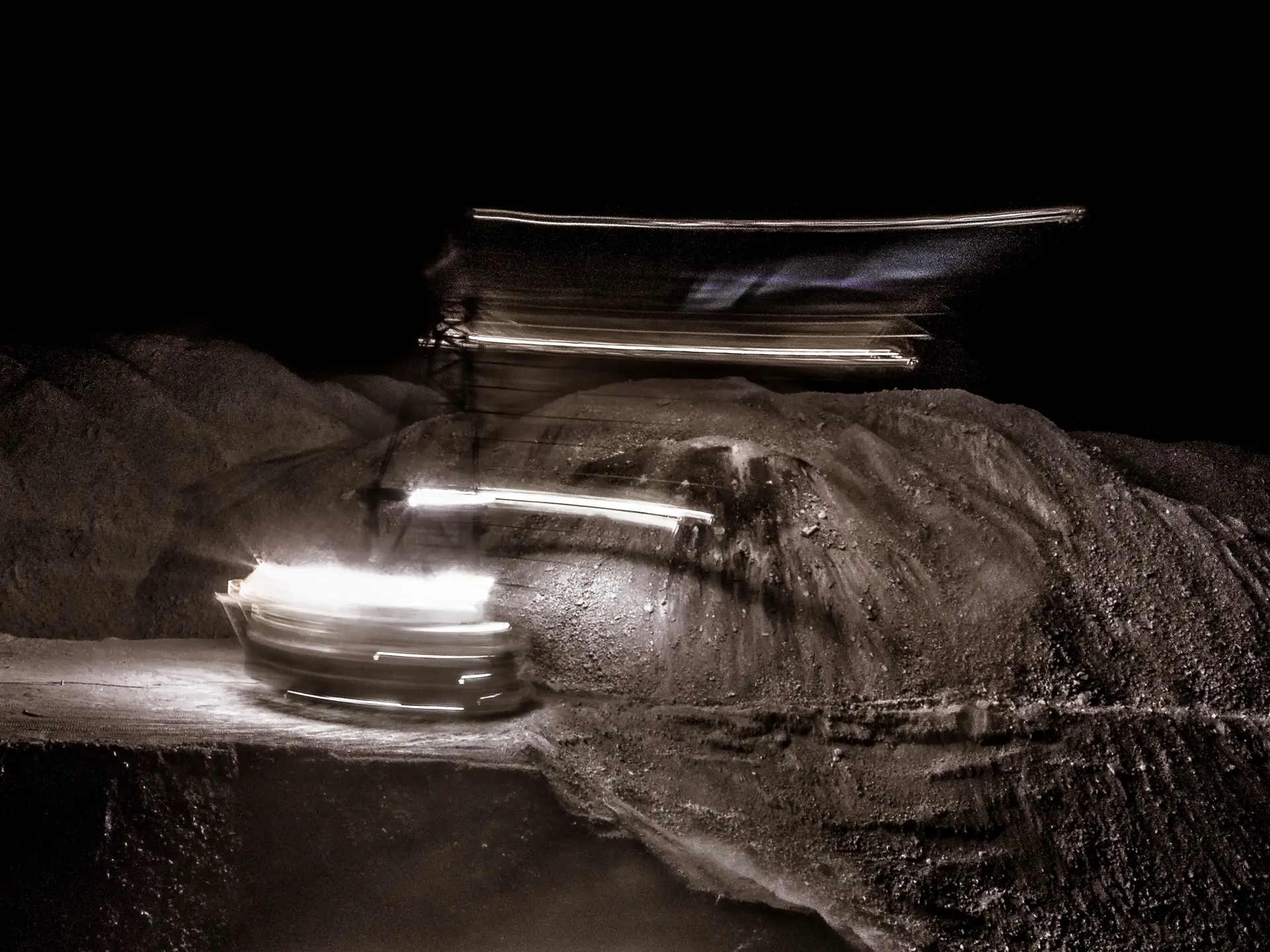 Damien Keffyn – Dragline in motion at night on a Queensland mining site, photographed by a professional mining photographer.